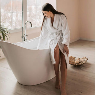 A woman is relaxing in bath