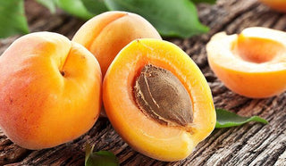 Apricot fruits with seeds that are used to extract oil.