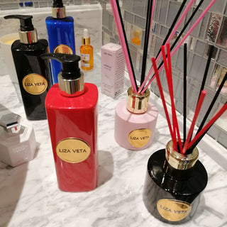 body care products and reed diffusers in the bathroom