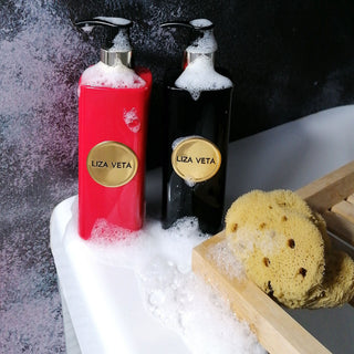 Natural skincare and body care products are in the bathroom with a body sponge.